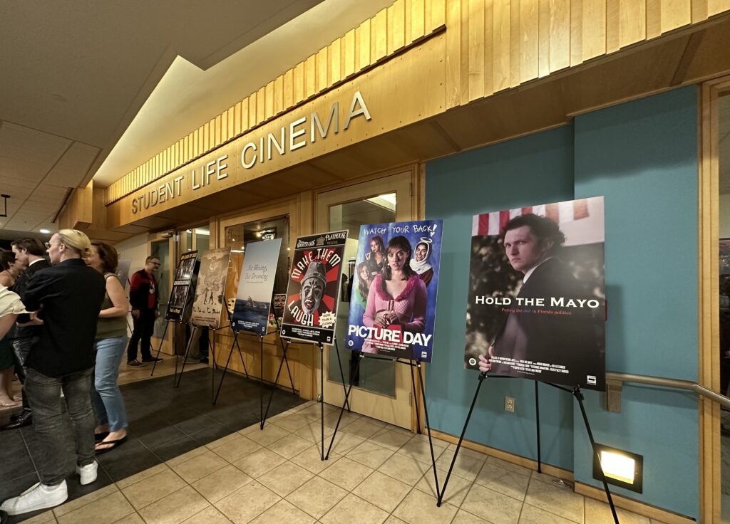 Six movie posters displayed in a hallway at Florida State University