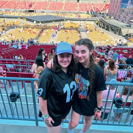 Lisa and Anna at Raymond James Stadium in front of Taylor Swift's stage.