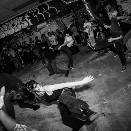 black and white photo of young people dancing